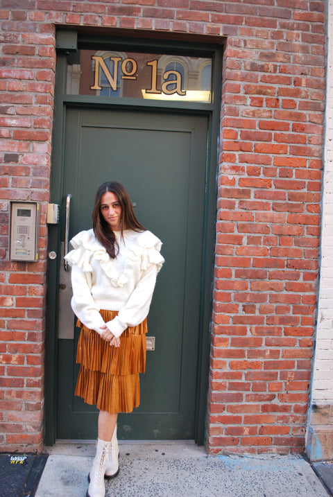 Ruffled knit cream sweater