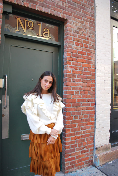 Ruffled knit cream sweater